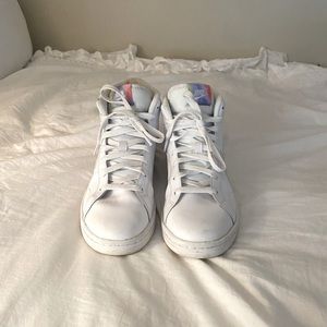White Nike high-tops with tie-dye swoosh